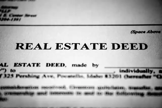 Close-up of a real estate deed document filed in Brevard County Florida.
