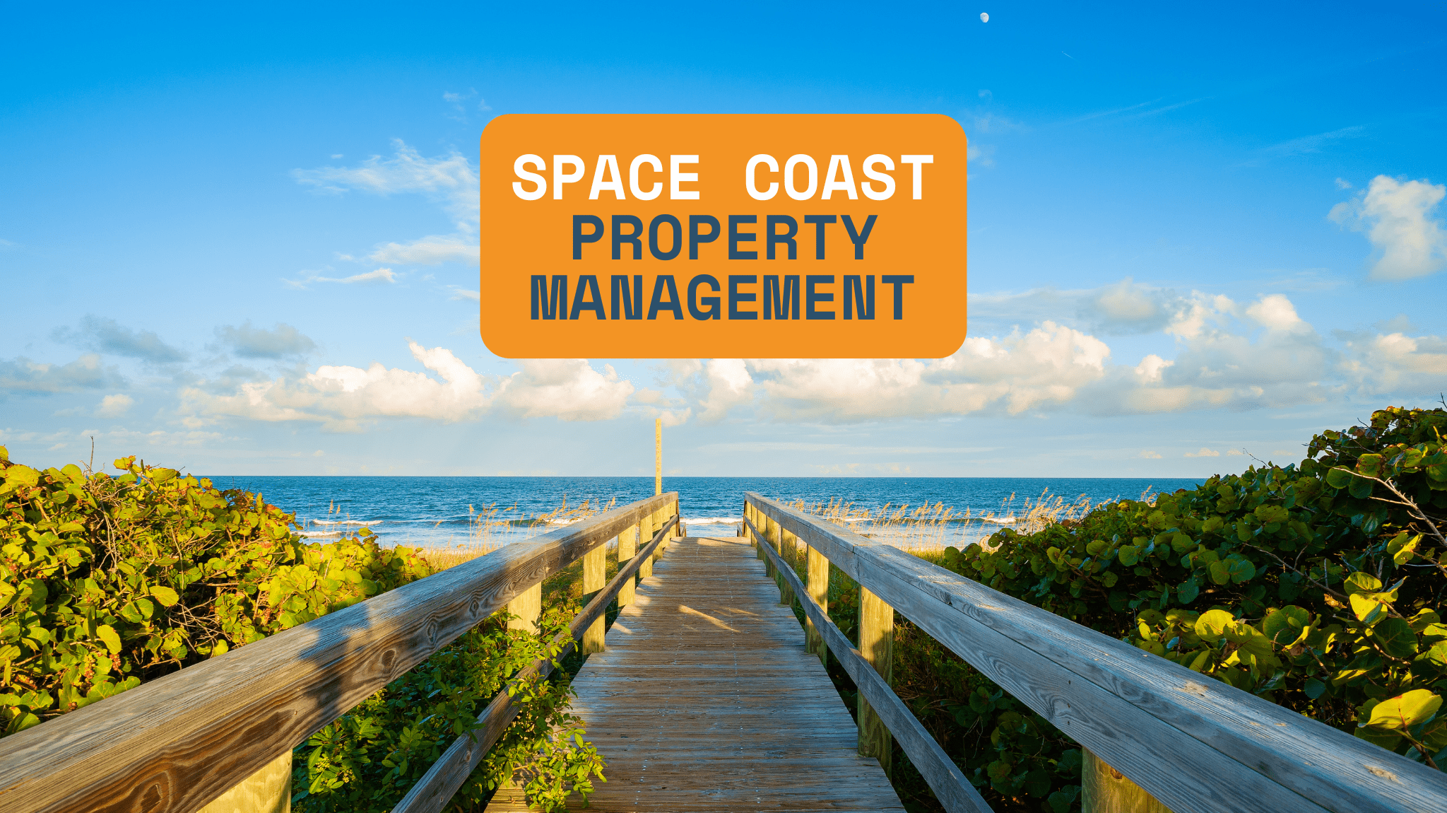 Wooden boardwalk leading to the Atlantic Ocean under a blue sky, with a sign that reads ‘Space Coast Property Management.’